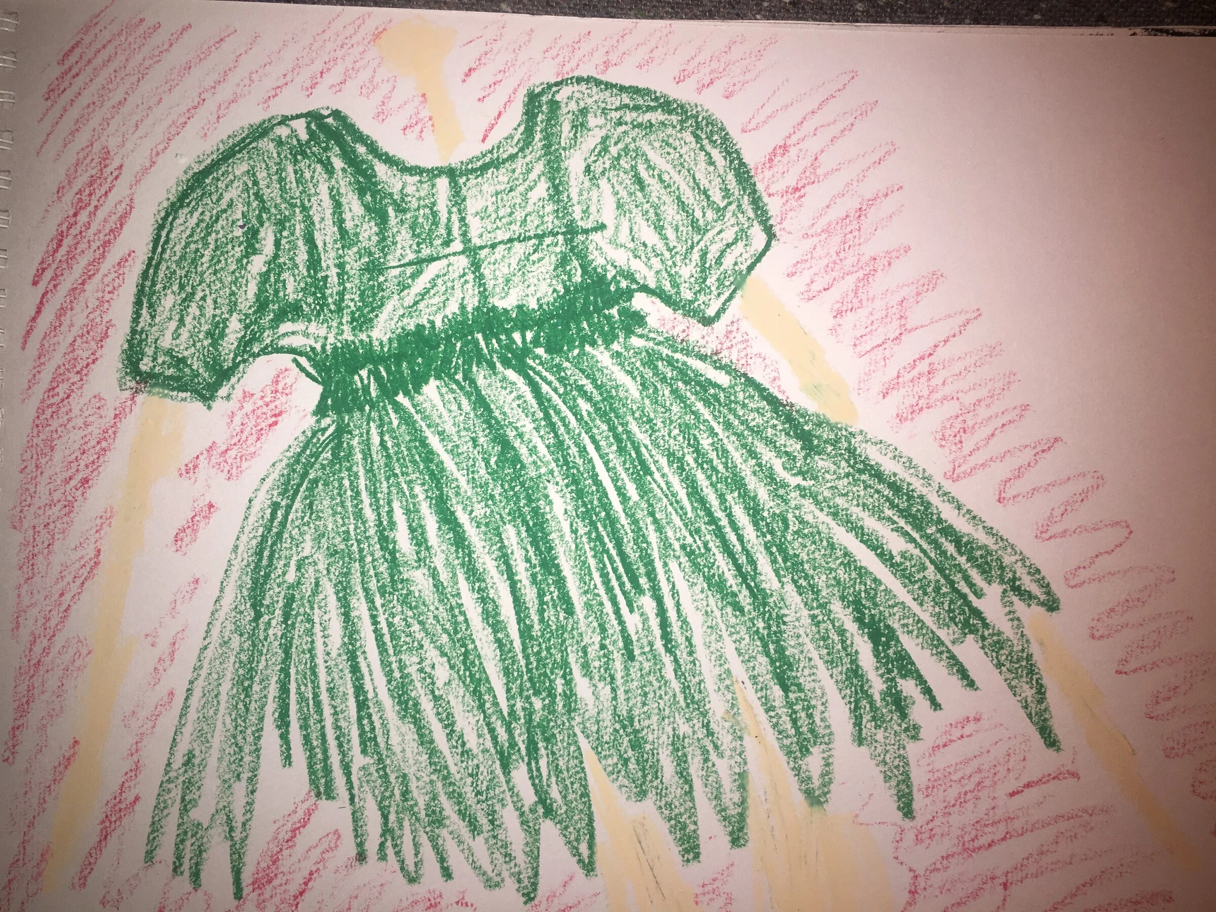 A drawing of a green dress on a pink background.