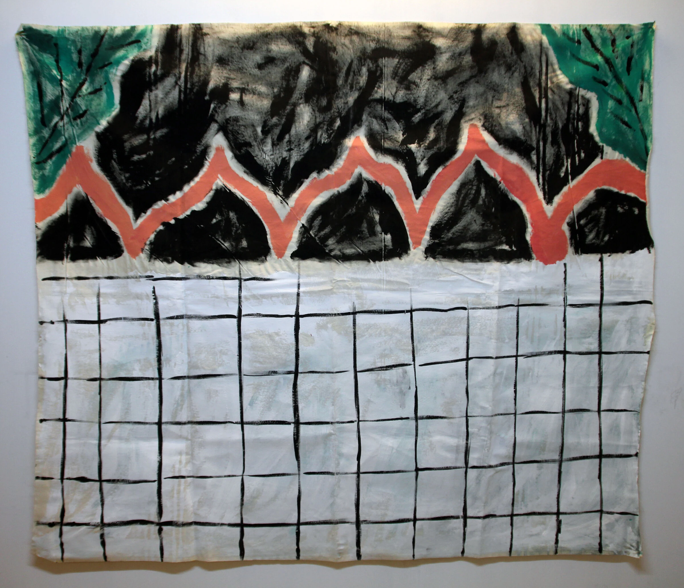 A canvas backdrop with black and green shapes above an orange zigzag and a white field of black grid lines.