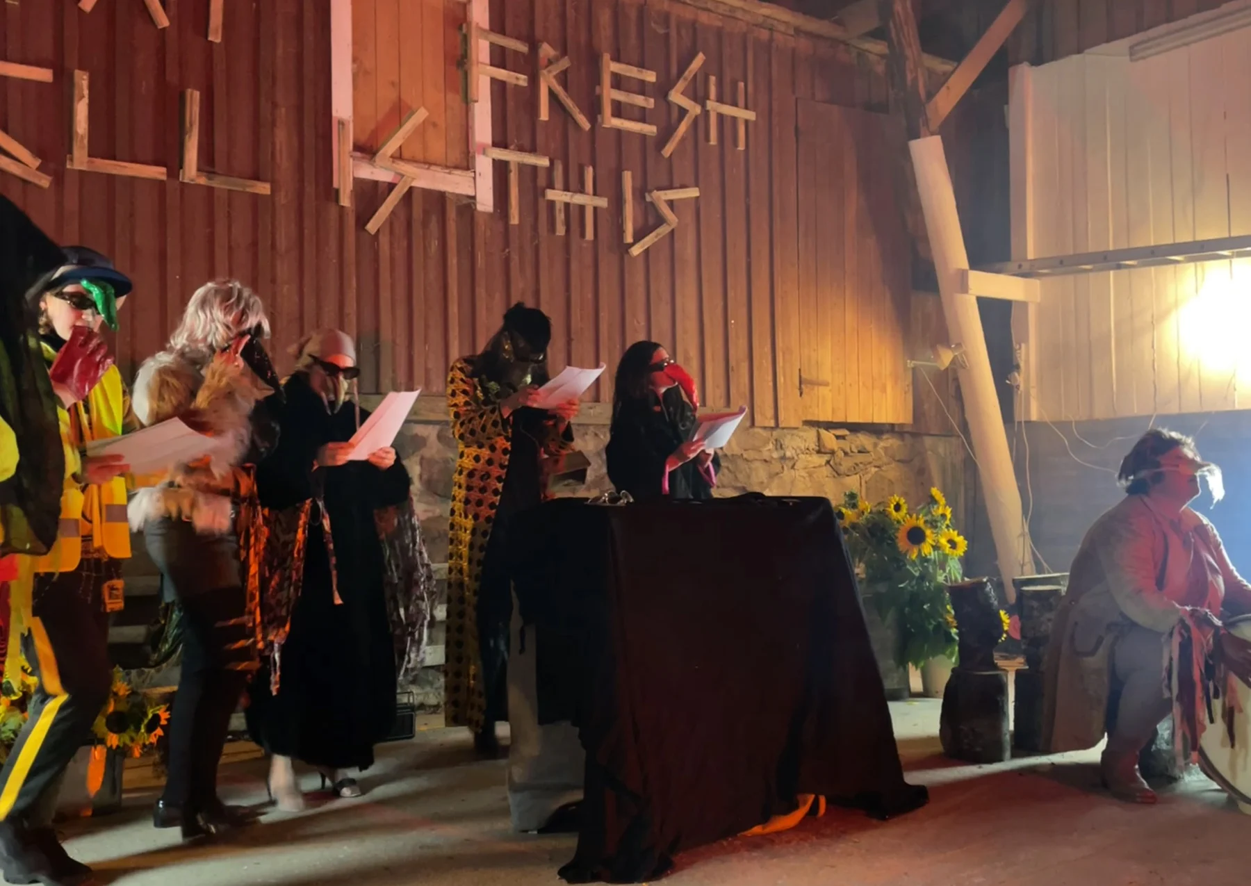 Performers staging DONDA inside a timber barn at Boalt residency.
