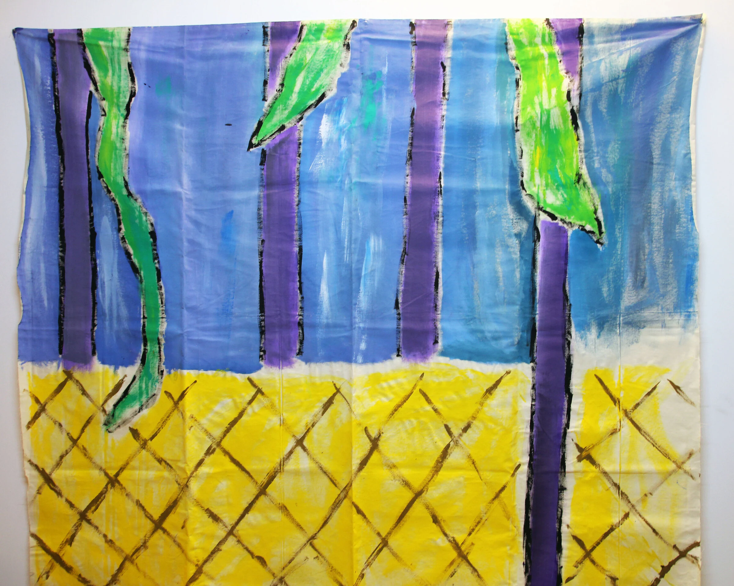A blue canvas backdrop with purple columns, green curved shapes and a yellow diamond-patterned floor.