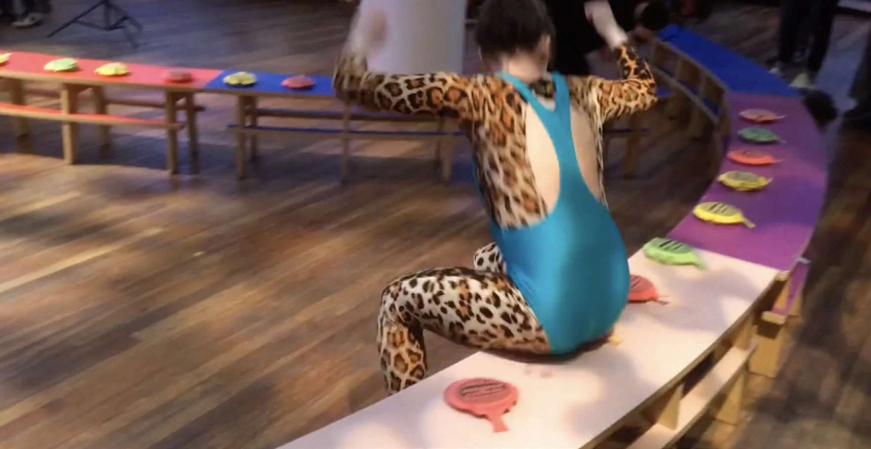 Charlotte Gash attempting a whoopie-cushion world record in front of an audience.